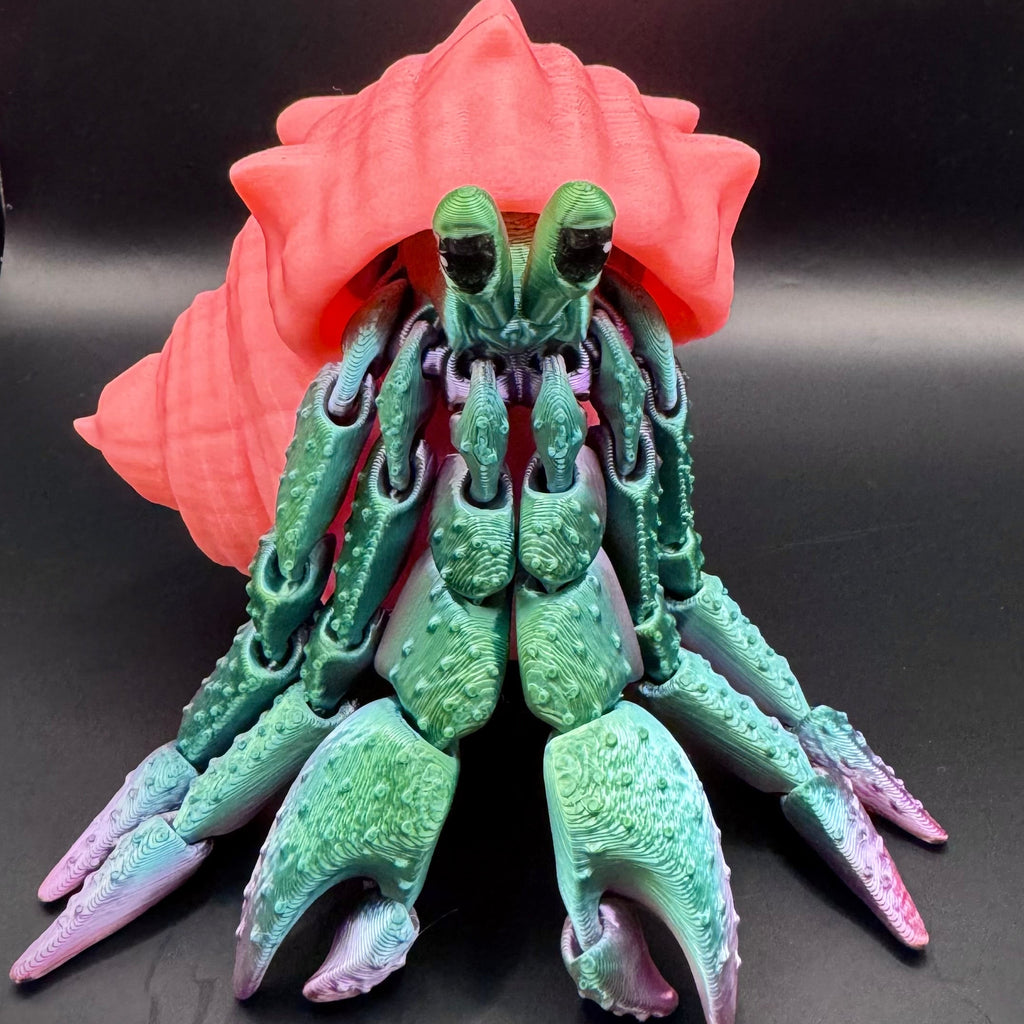 Green and purple ombre 3d printed hermit crab with pink shell 