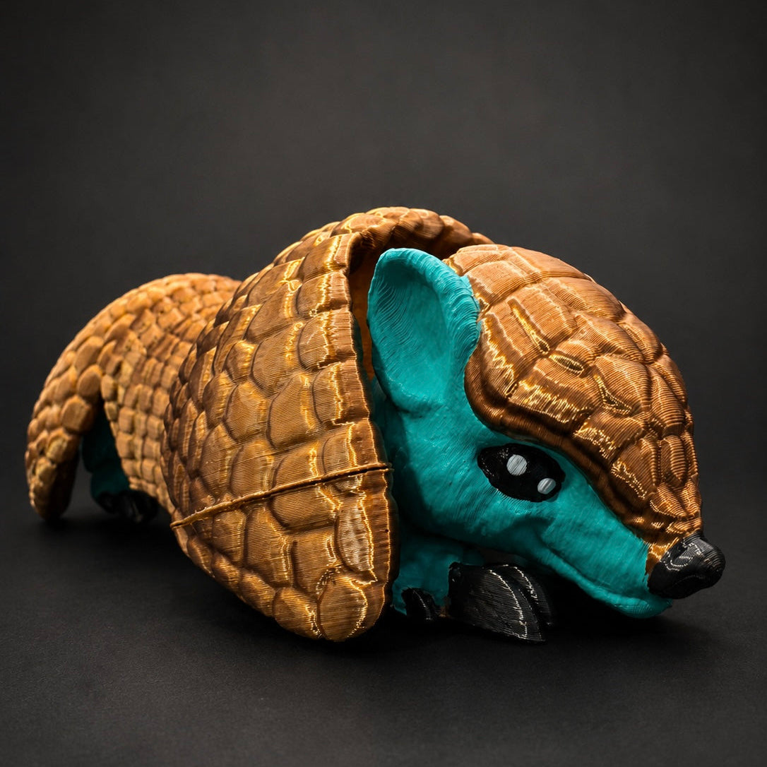 Close-up of Burrow Bell’s turquoise face, painted eyes, black claws, and layered bronze shell.