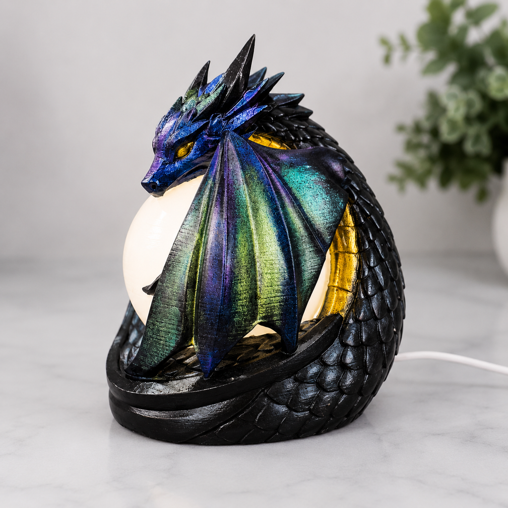 Left side view of the Midnight Sentinel dragon lamp showing color-shifting wing details and glowing orb