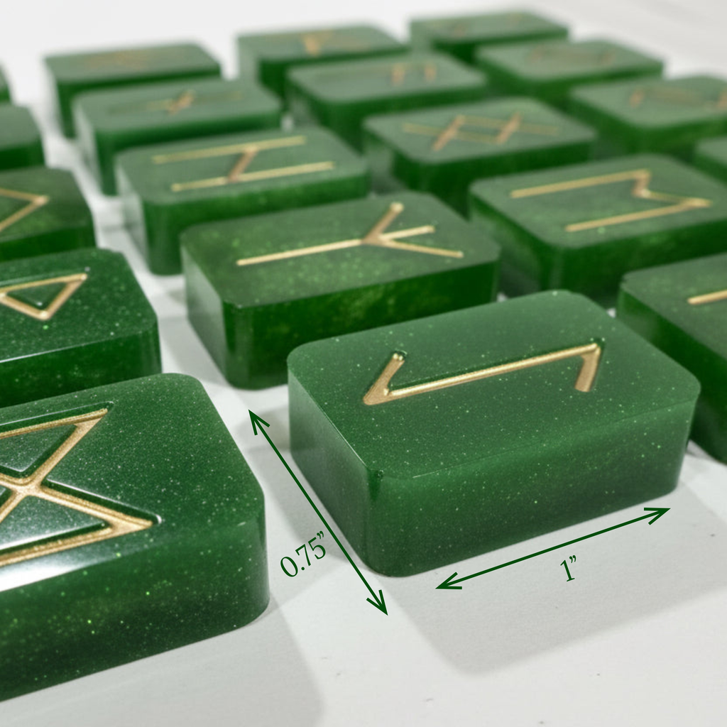 Green shimmer resin rune stones with gold inlays from an Elder Futhark rune set are displayed on a white surface to display measurement
