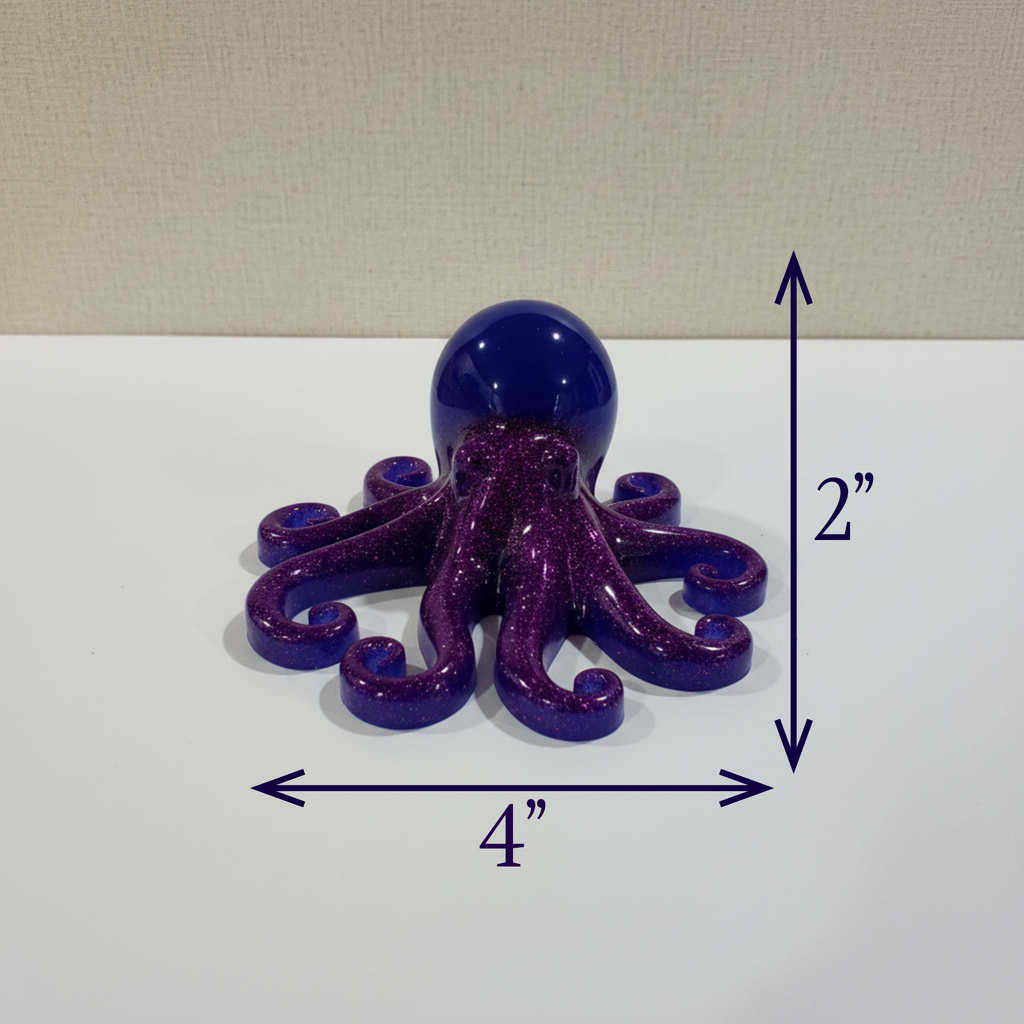 Glow-in-the-dark resin octopus sculpture with purple glitter body and blue glow head displayed on a white table to display measurement