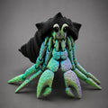 Sea Glass Hollow articulated hermit crab companion with a matte black shell and fluorite color-shifting body on a charcoal studio background.