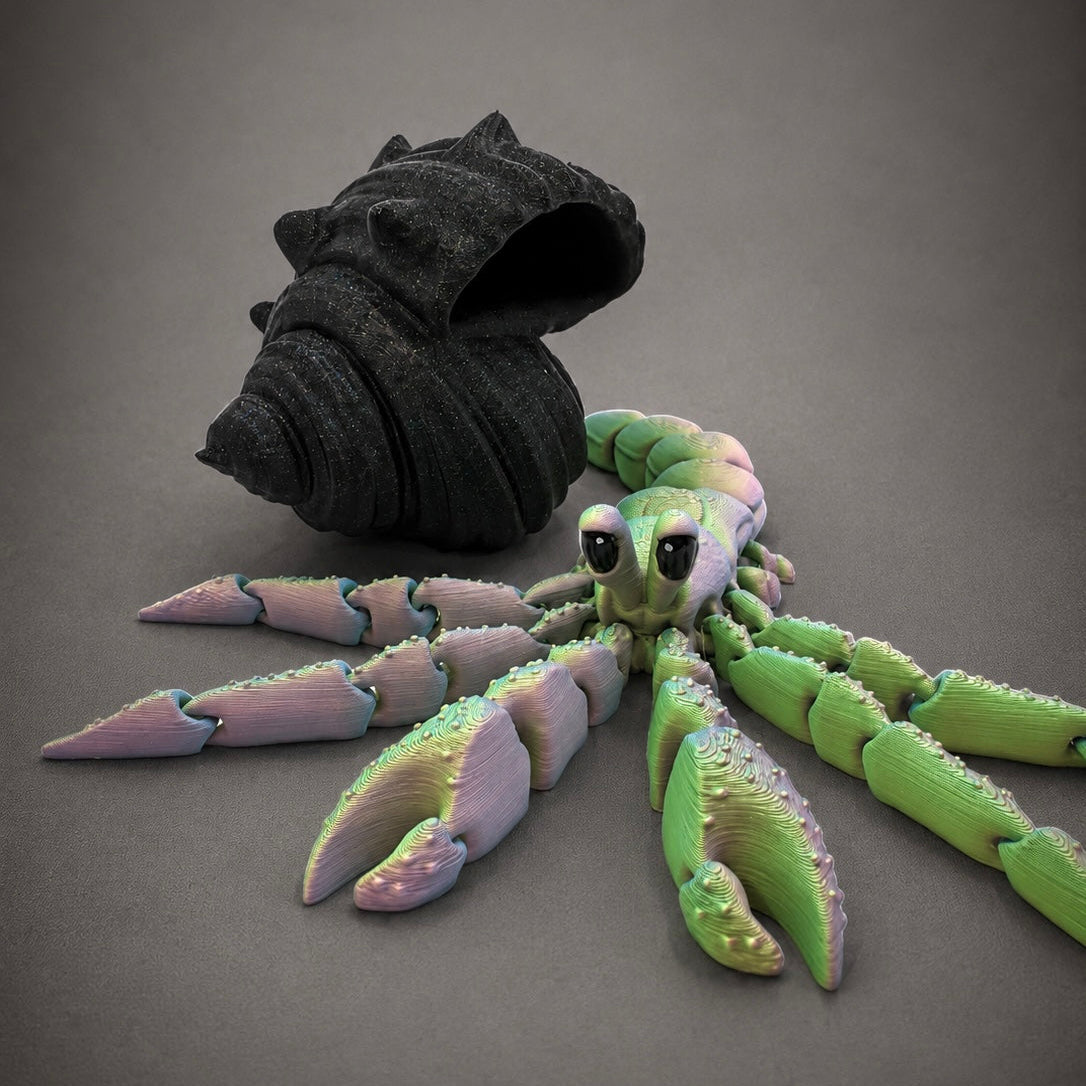 Sea Glass Hollow displayed outside its removable shell, showing the fully articulated hermit crab body beside the sculpted shell.
